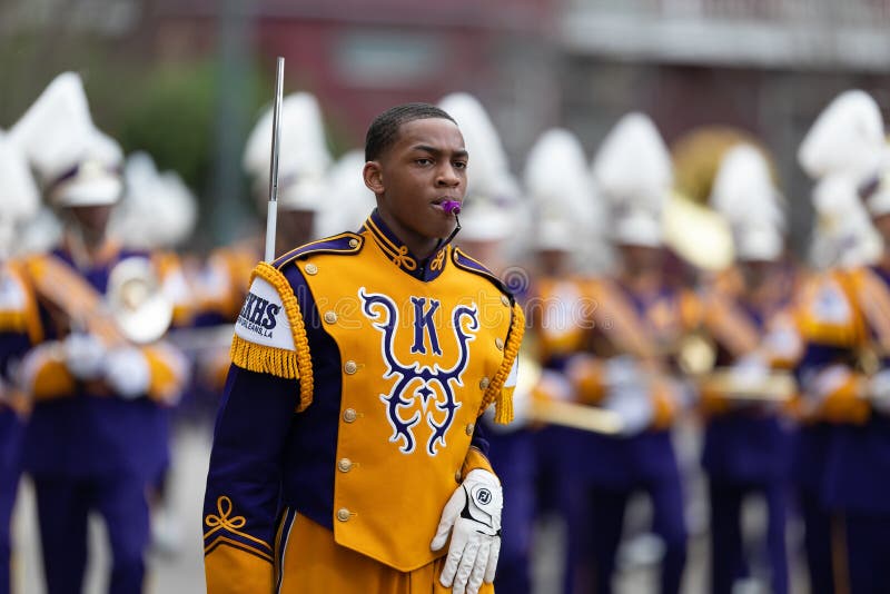 New Orleans, Louisiana, USA - February 23, 2019: Mardi Gras Parade, The Edna Karr High School Marching Cougars, performing at the parade. New Orleans, Louisiana, USA - February 23, 2019: Mardi Gras Parade, The Edna Karr High School Marching Cougars, performing at the parade