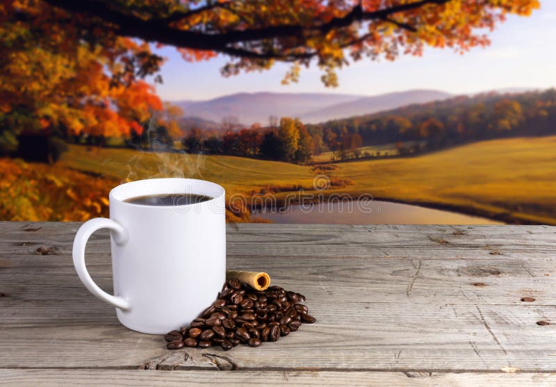 Coffee in white cup ceramic old wooden table with view landscape autumn. Coffee in white cup ceramic old wooden table with view landscape autumn