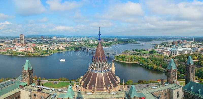 Ottawa cityscape panorama in the day over river with historical architecture. Ottawa cityscape panorama in the day over river with historical architecture.