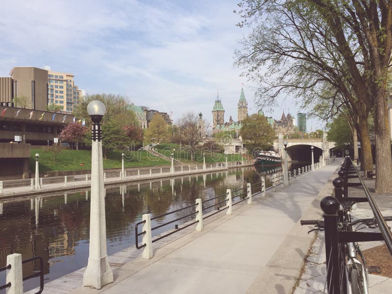 Ottawa's Rideau Canal and Canada's Parliament on a spring morning stock image Ottawa's Rideau Canal and Canada's Parliament on a spring morning stock image