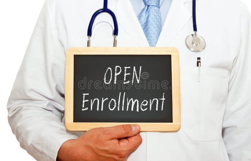 Doctor in white coat with stethoscope holding a blackboard with graphic open enrollment in white chalk text on white background. Doctor in white coat with stethoscope holding a blackboard with graphic open enrollment in white chalk text on white background.