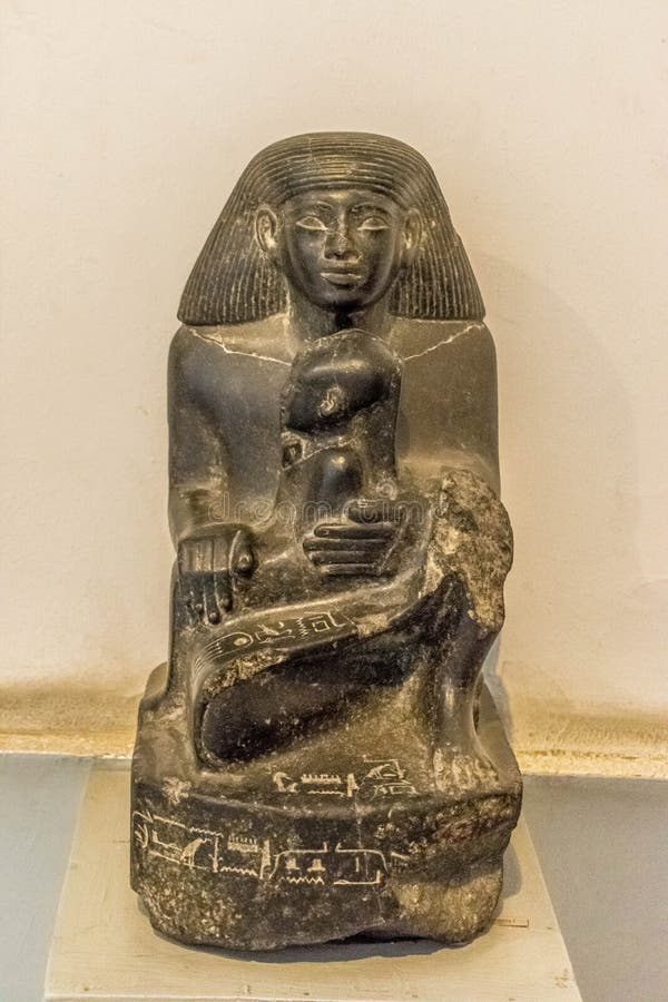 Oud Egyptisch beeldje van moeder en kind royalty-vrije stock afbeeldingen Oud Egyptisch beeldje van moeder en kind royalty-vrije stock afbeeldingen
