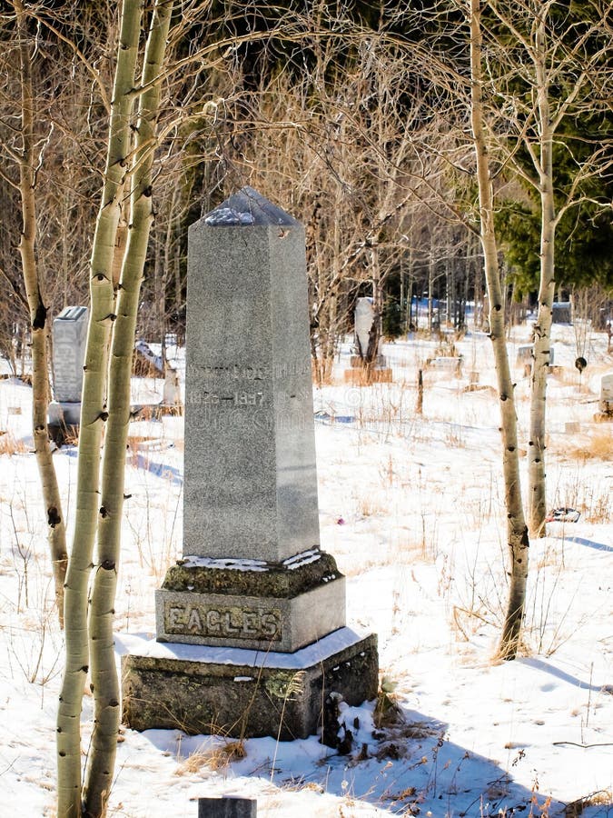 Georgetown, Colorado-January 17, 2012: Alvarado cemetery from 1800s near Georgetown, Colorado. Georgetown, Colorado-January 17, 2012: Alvarado cemetery from 1800s near Georgetown, Colorado.