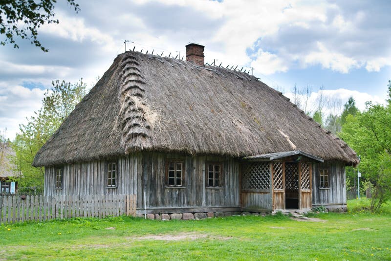 Old rural house with thatched roof near Bialystok, Poland. Old rural house with thatched roof near Bialystok, Poland