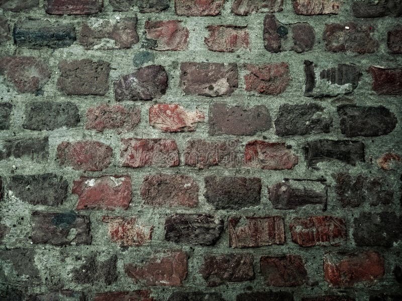 Oude bakstenen muur met veel textuur en kleuren royalty-vrije stock foto Oude bakstenen muur met veel textuur en kleuren royalty-vrije stock foto