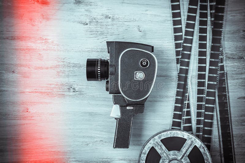 Oude filmcamera en film royalty-vrije stock foto's Oude filmcamera en film royalty-vrije stock foto's