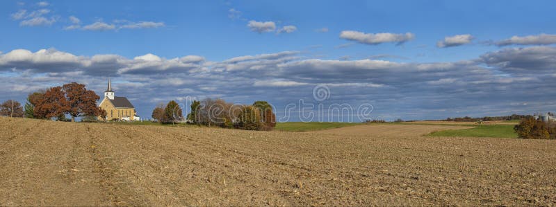 Panoramic scene of an old country limestone church in Wisconsin. Panoramic scene of an old country limestone church in Wisconsin.