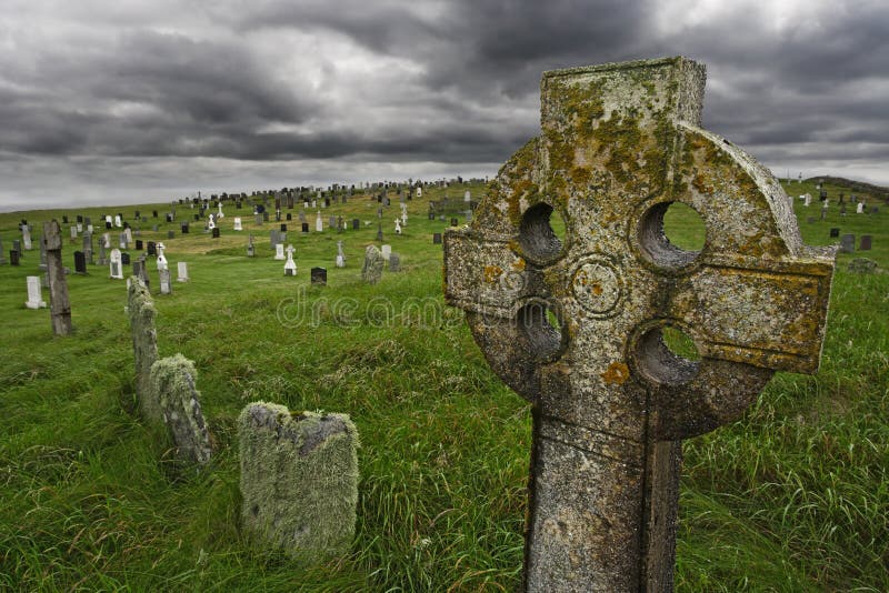 Old Celtic gravesite with unmarked gravestones from the 1600's in the middle of a meadow in rural Scotland. Old Celtic gravesite with unmarked gravestones from the 1600's in the middle of a meadow in rural Scotland.