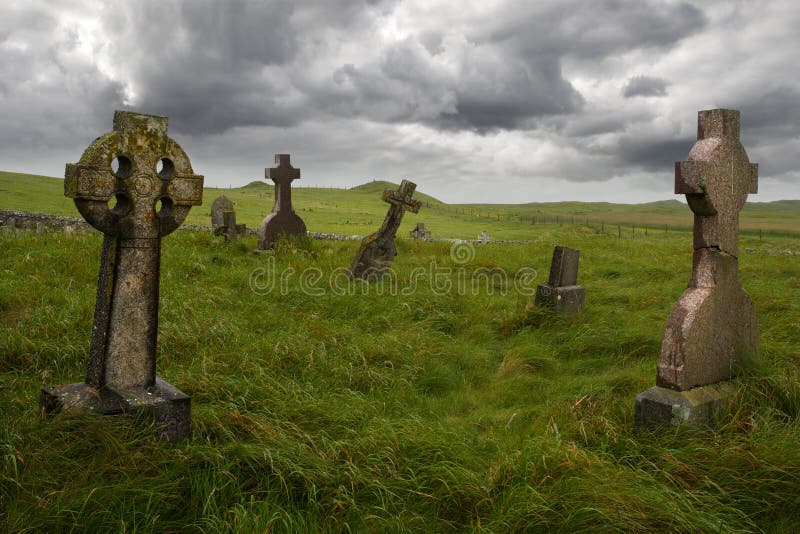 Ancient Celtic gravesite with unmarked gravestones in the middle of a meadow in rural Scotland. Ancient Celtic gravesite with unmarked gravestones in the middle of a meadow in rural Scotland.