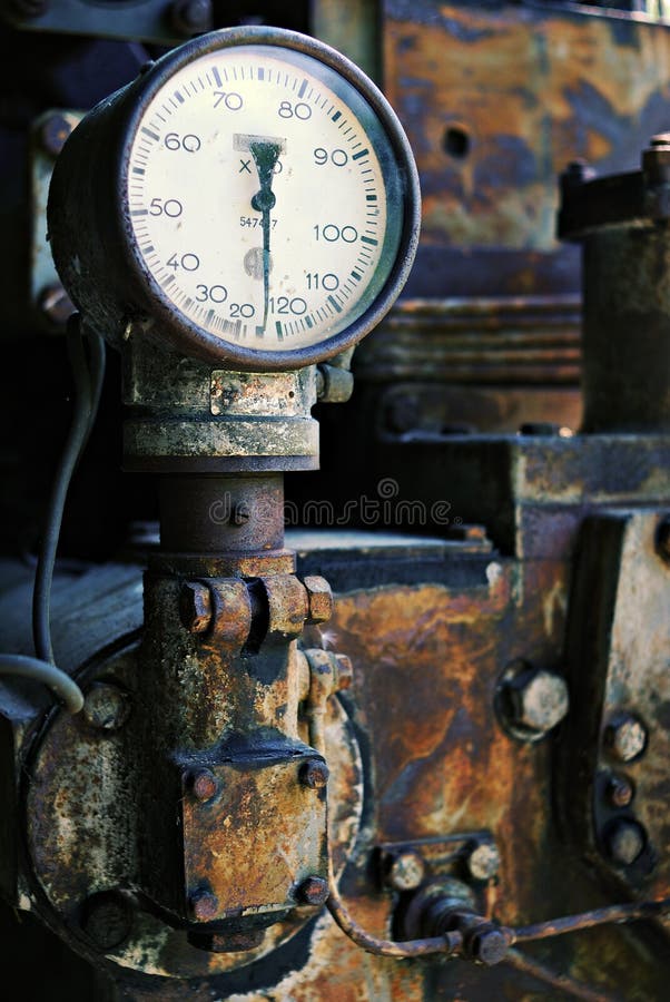 Rusted guage with its meter on zero surrounded by rust. Rusted guage with its meter on zero surrounded by rust.