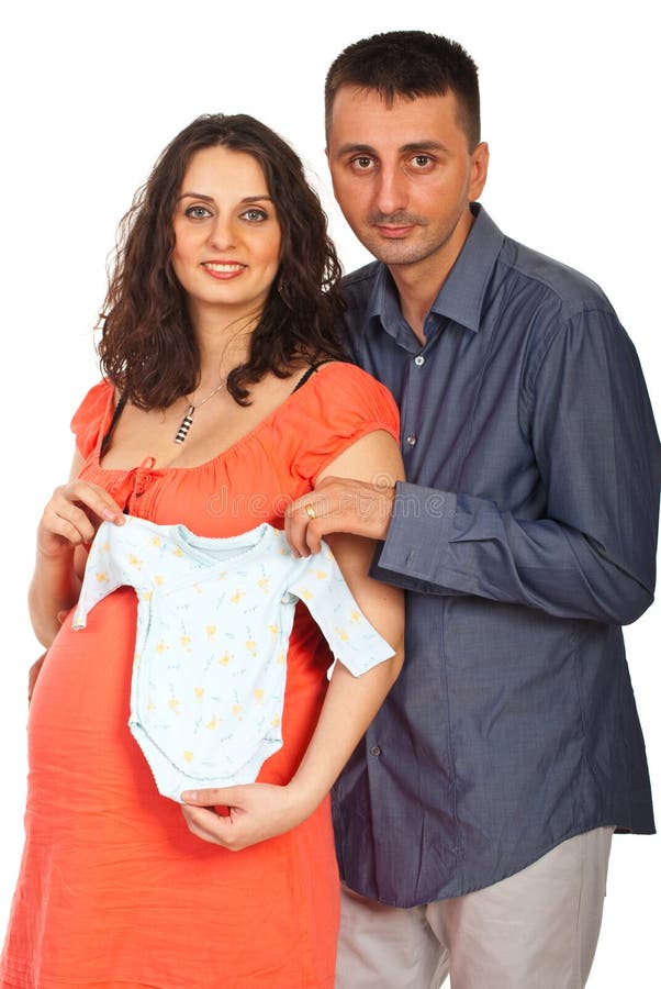 Ouders die de doek van de babyjongen tonen stock afbeelding Ouders die de doek van de babyjongen tonen stock afbeelding
