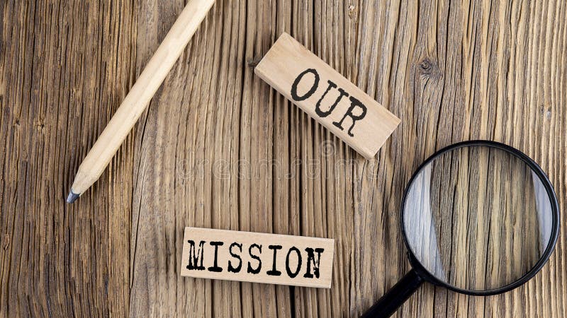 OUR MISSION words on wooden building blocks on the wooden background stock images