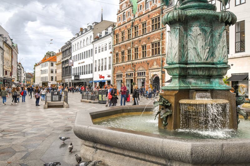 Ourists wander the Stroget shopping district near the Stork Fountain in Copenhagen Denmark stock photos Ourists wander the Stroget shopping district near the Stork Fountain in Copenhagen Denmark stock photos