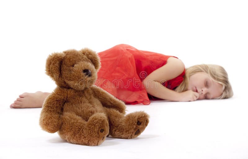 Ours de nounours et fille de sommeil image libre de droits Ours de nounours et fille de sommeil image libre de droits