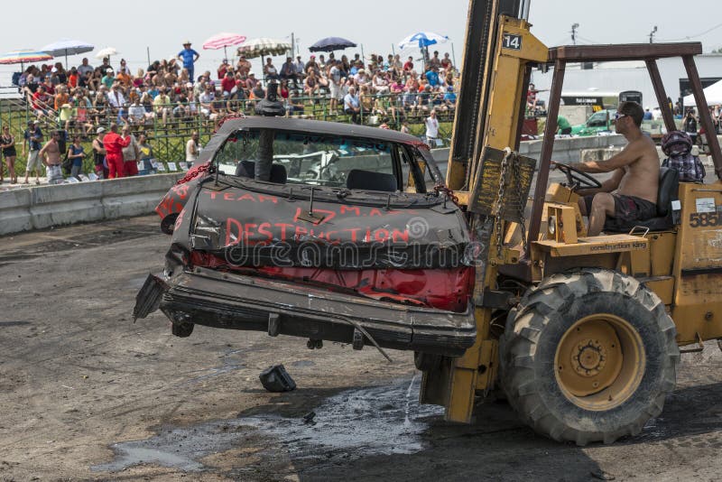 Napierville demolition derby, July 12, 2015, picture of wrecked car go out during the demolition derby. Driver banging stock images, royalty-free photos and pictures