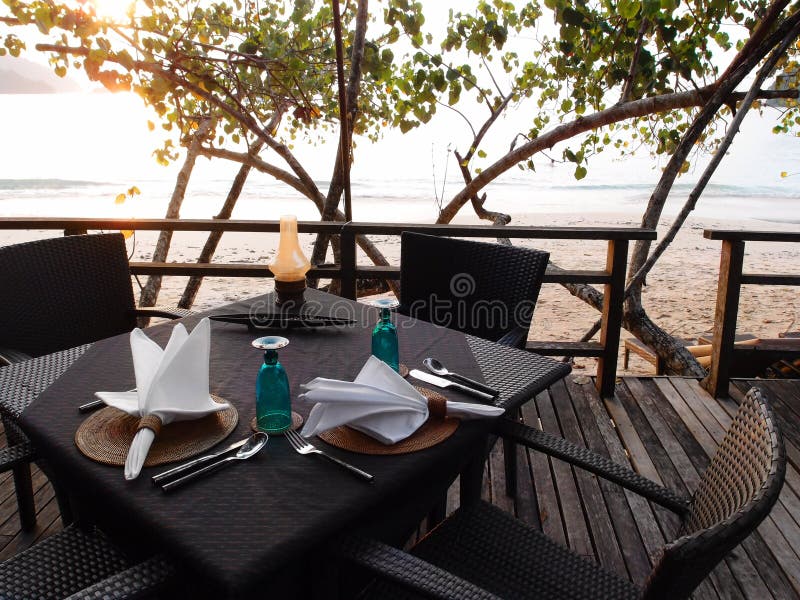 Outdoor beachfront dining resort restaurant