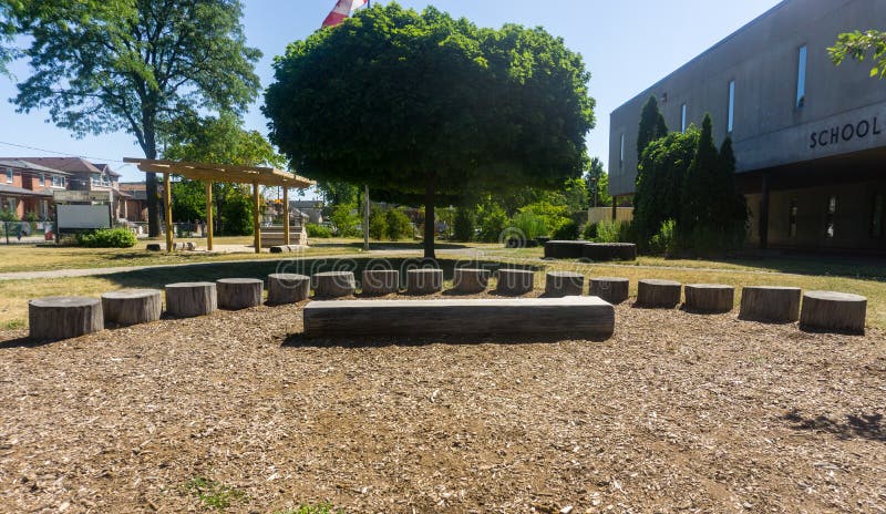 Outdoor classroom on school grounds amphitheatre class stage tree stock images