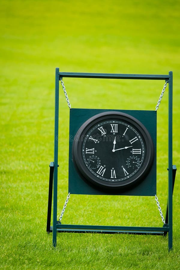 Outdoor Clock on Golf Course with Green Spring Valley on the Background