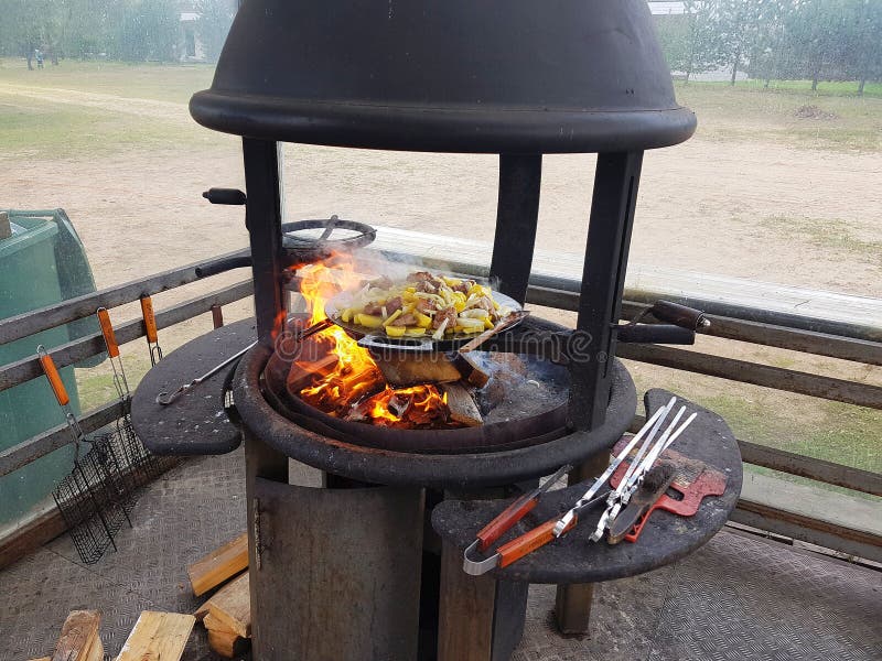 Outdoor Cooking on an Open Fire Stock Photo Image of gourmet, flame