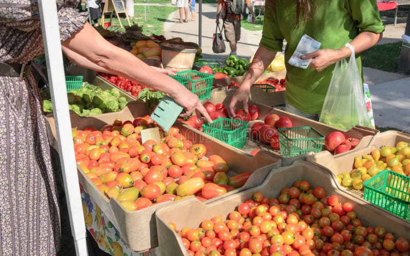 Organic produce being sold at farmers market. Food vendor sold stock images, royalty-free photos and pictures