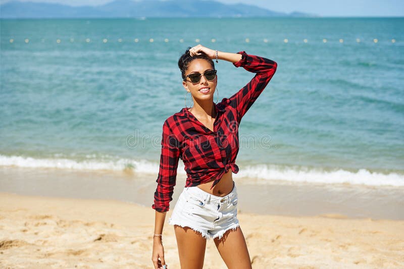 Outdoor Fashion Portrait of Cute Beautiful Brunette Woman in Sunglasses on  a Beach. Stylish Girl in Summer Casual Clothes Stock Photo - Image of  shorts, modern: 172085874