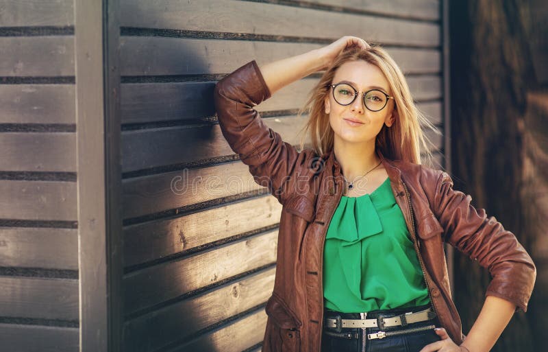 Young woman wearing glasses. Outdoor portrait royalty free stock photos Young woman wearing glasses. Outdoor portrait royalty free stock photos
