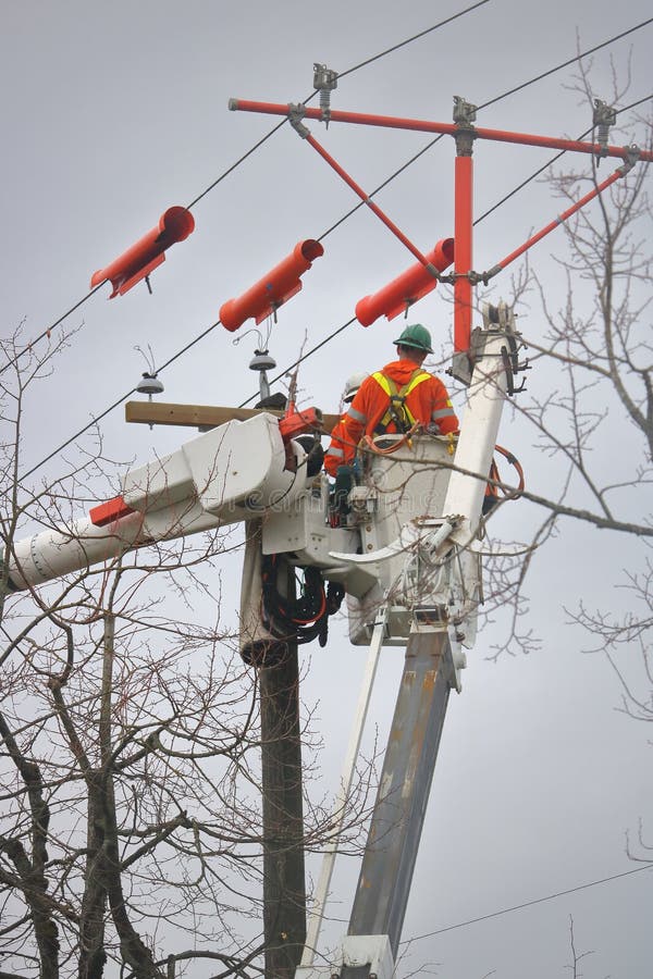 Outdoor Hydro Crew Repairing Electric Line stock photos Outdoor Hydro Crew Repairing Electric Line stock photos