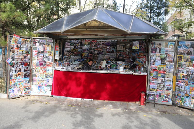 Outdoor newspaper and snack stand in Beijing, China stock images Outdoor newspaper and snack stand in Beijing, China stock images