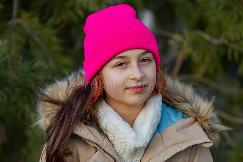 Outdoor Portrait of Girl Wearing Warm in a Pink Hat. Schoolgirl Girl in ...