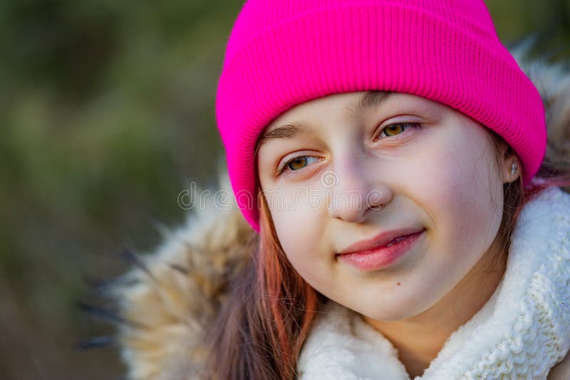 Outdoor Portrait of Girl Wearing Warm in a Pink Hat. Schoolgirl Girl in ...