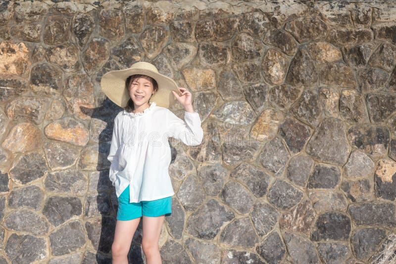 Outdoor portrait of a pretty asian girl in hat ,closeup of beaut royalty free stock image Outdoor portrait of a pretty asian girl in hat ,closeup of beaut royalty free stock image