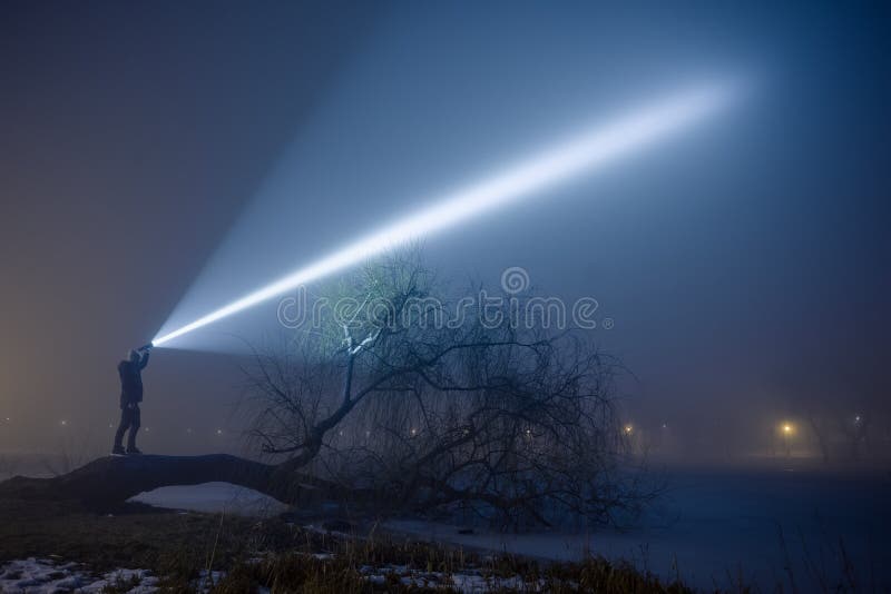 Outdoor Searching with Flashlight at Night. Stock Photo Image of