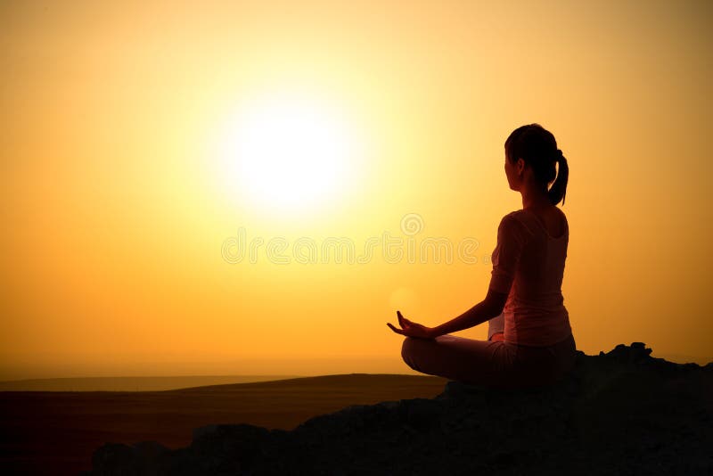 Outdoor sunrise yoga girl