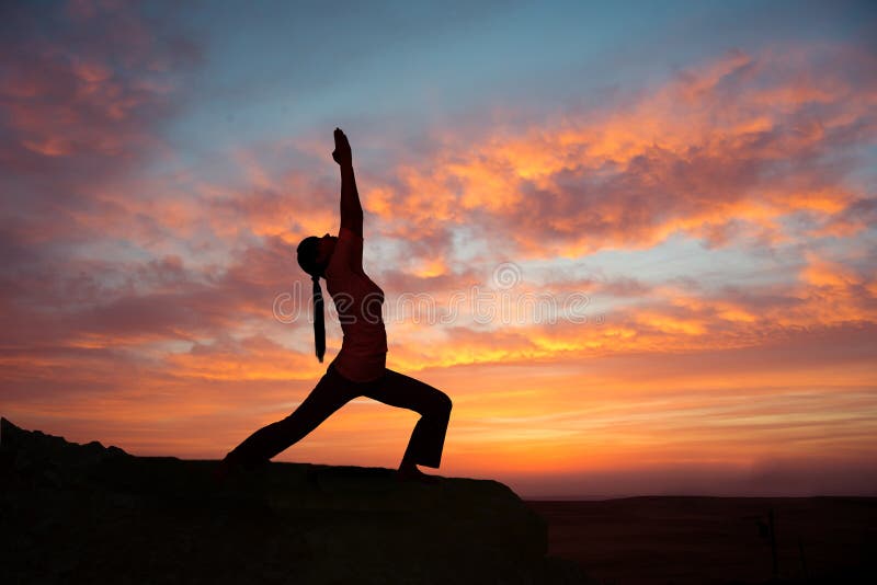 Outdoor sunrise yoga girl