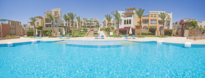 Outdoor swimming pool in a luxury tropical hotel resort