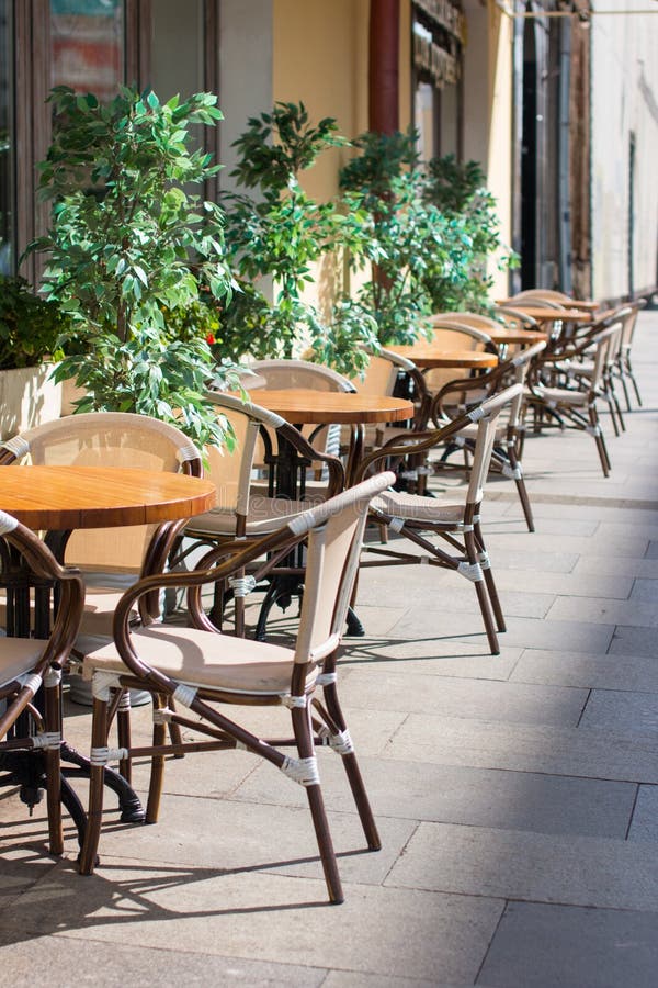 Outdoor tables in cafes. stock image. Image of seat 230108379