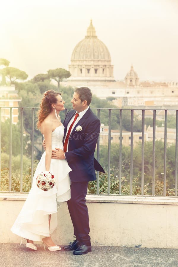 Outdoor wedding couple in town. Rome Italy. Vatican. Romance. royalty free stock photo Outdoor wedding couple in town. Rome Italy. Vatican. Romance. royalty free stock photo