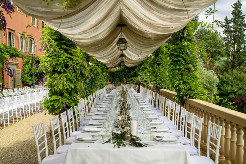 Outdoor wedding table decor Villa Le Fontanelle  Tuscany  Italy.