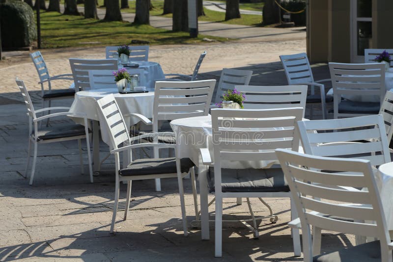 Outdoor White Cafe Tables and Chairs Stock Image Image of leisure