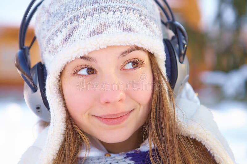 Download Outdoors On A Winter Day. Woman Listening Music. Stock Image - Image of listening, beautiful ...