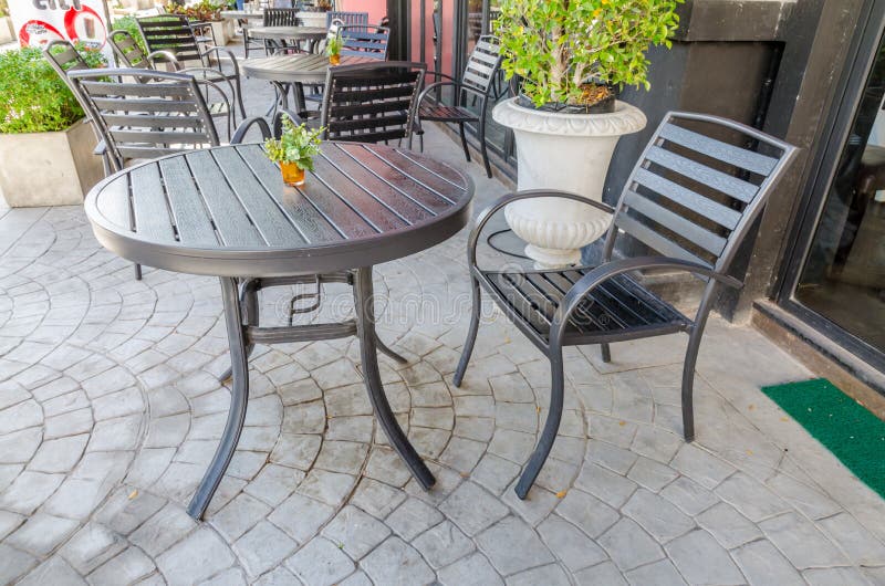 Garden Patio with Round Table and Two Chairs. Outdoor Furniture Made of