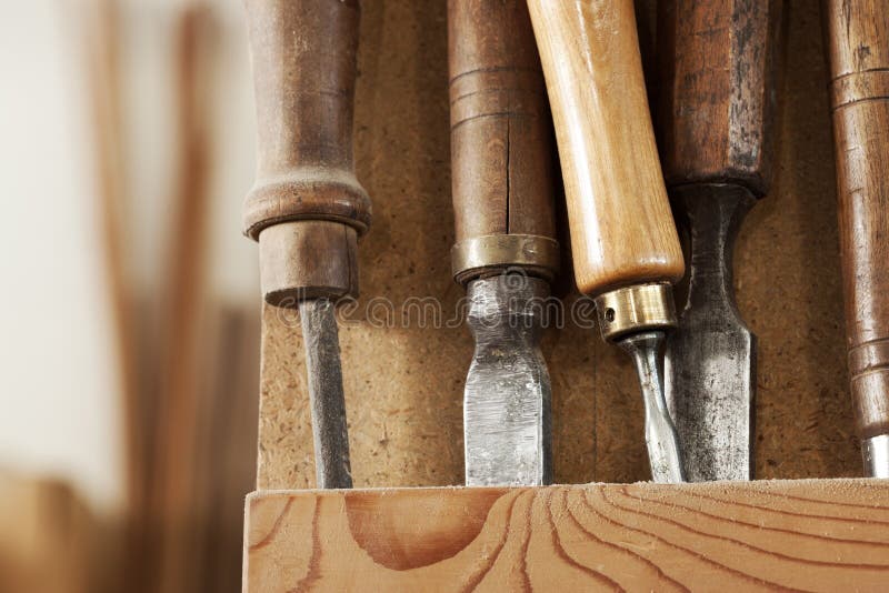 Set of carpenter tools on a wooden rack. Set of carpenter tools on a wooden rack.