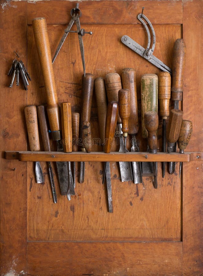 Old woodworking tools in carpentry shelf. Close up. Old woodworking tools in carpentry shelf. Close up.