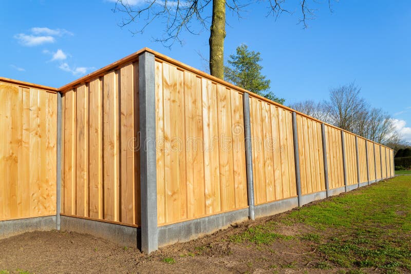 Outside new wooden fence around garden