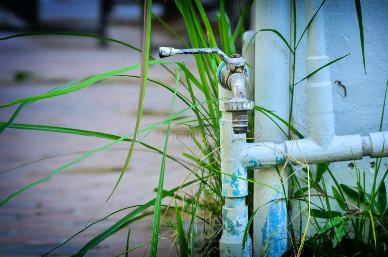 Outside Water Faucet and Pipe Line Stock Image Image of running