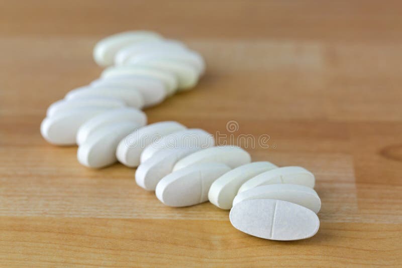 Oval Calcium Magnesium vitamin tablets to prevent osteoporosis