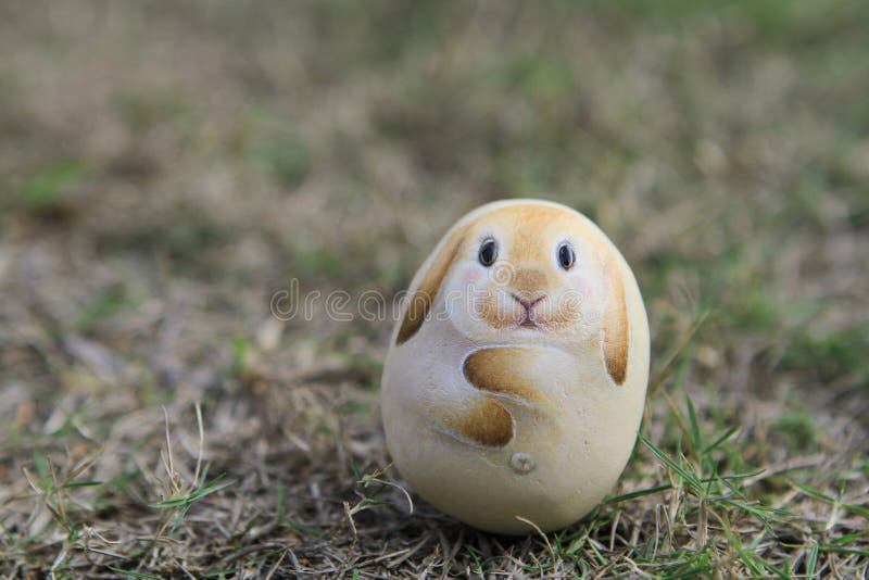 the lovely stone of easter bunny onlawn