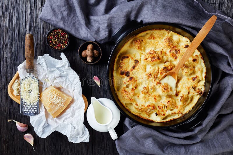 Oven baked cauliflower cheese, flat lay stock photography