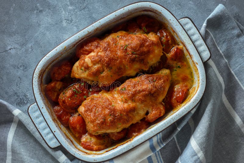 Ovenbaked Chicken Breast with Mozzarella and Tomatoes. Stock Photo