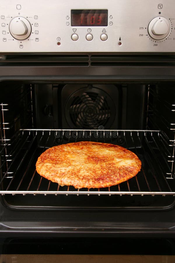 Oven baked homemade pizza stock photo. Image of heat 17230626